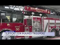Community rallies to support two West Virginia state troopers shot serving arrest warrant