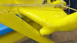 Tensioning the oar rope.