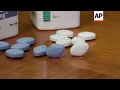 Little blue pills turn white as Viagra goes generic