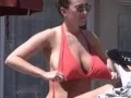 Girl showing Boobs on BEACH
