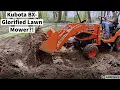 Kubota BX Clearing land Removing a stump