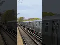 R211T D train flies past Avenue J on Brighton Express