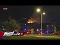 Crews fight apartment building fire on Chouteau Ave