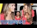 Liz Hurley risks nip slip wardrobe malfunction in plunging dress as she oddly carries LAMP