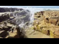 Big Rock in water slow motion