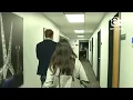 Ryan Walters and Madison Cercy walkout of studio