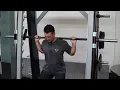 Smith machine hack squat