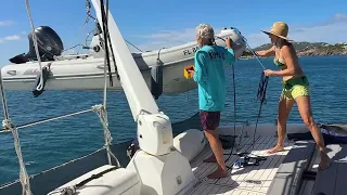 HOISTING OUR DINGHY….WHAT COULD POSSIBLY GO WRONG? #trawlerlife #luxuryyachtlife #boatlife