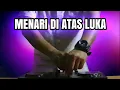 Download Lagu DJ MENARI DI ATAS LUKA FULL BASS - REMIX ENAK TERBARU 2021