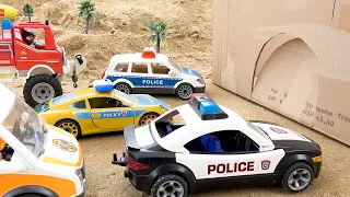 Bibo plays with toy cars police cars fire trucks and cardboard box