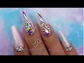 Rainbow nails with Aurora pigment Swarovski crystals and pastel gel polish tie dye nail design