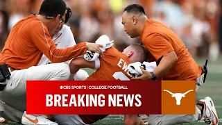 Texas star quarterback Quinn Ewers leaves the game in the 2nd Quarter with strained abdomen
