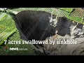 Lagu Indonesian sinkhole expands one meter every day as homes and farms threatened