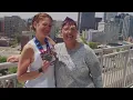 Mom motivates marathon runner with comical signs
