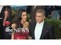 George and Amal Clooney settling into their new role as parents