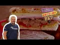 Guy Fieri Eats a Cuban-Style Sandwich at the Pit Stop Diners Drive-Ins and Dives Food Network