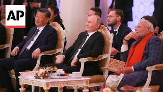 Putin hosts China's Xi Jinping and India's Narendra Modi at BRICS summit in Russia