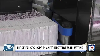 USPS temporarily blocked from enforcing new rule to restrict some mail-in ballots