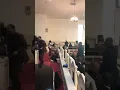 Crystal Smith singing at Johnteris Tate prayer bowl in 2018
