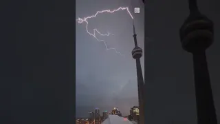 Watch lightning strike the CN Tower during severe weather