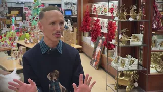 A local Dillard s manager is going viral for his holiday spirit