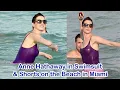 Anne Hathaway in Swimsuit Shorts on the Beach in Miami