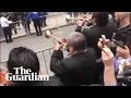 Mariachi band performs as part of protest outside Aaron Schlossberg s home