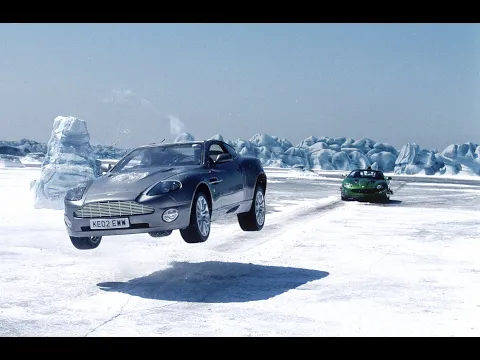 Download MP3 Aston Martin Vanquish Vs Jaguar XKR in James Bond car chase scene.