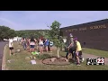 Volunteers help place memorials for 5 teens slain in Henryetta mass murder