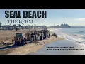 BUILDING A SAND BERM AT SEAL BEACH TO PREVENT FLOODING