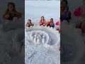 Boys destroy the girls sand castle
