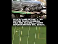 Lagu Police chase ends with car driving across football field, basketball court and crashing into school