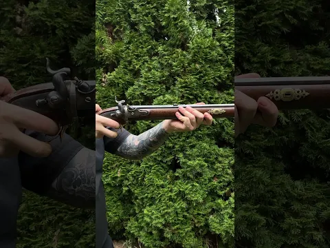 Old swivel barrel hunting rifle