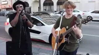 will i am surprises street performer levimitchell