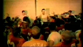 Coach Darrell Royal presents Freddie Steinmark with the game ball