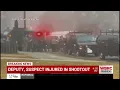 Deputy suspect injured in east Alabama shootout