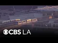 LAX people mover faces uncertainty as lender drops project s bond rating