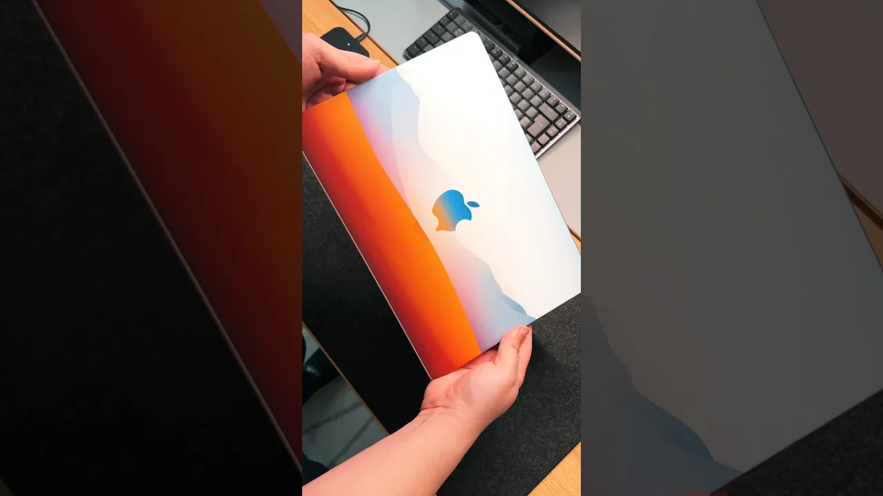 Custom MacBook skin being applied