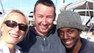 Decorating our mast for Christmas – Sailing Britican