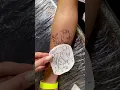 tattoo on hand lion and little lion cub
