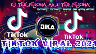 Download DJ TERPESONA AKU TERPESONA MENATAP MENATAP WAJAHMU YANG MANIS TIK TOK VIRAL 2021 MP3