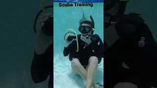 Sailing Bye Felicia steps off the boat to train SCUBA diving.