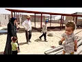 Download Lagu Working on the farm. Tayyiba with two children and striving for an uncertain future.