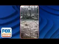 Raging River Comes Close to Bridge Outside of Duluth Minnesota