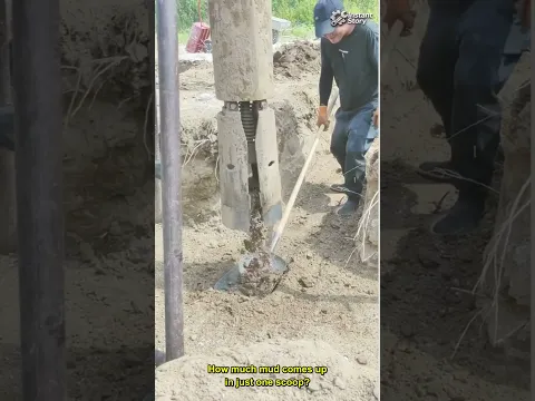 Bucket auger pulling wet mud out of a bore hole #Shorts #construction
