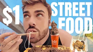 eating all the food I possibly can at night market in Thailand