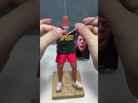 iShowSpeed as a handmade polymer clay bobblehead! Crazy face, funny body, and a shaking head effect.