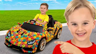 كريس يفتتح متجر سيارات الحلوى - الأطفال يركبون سيارات الألعاب