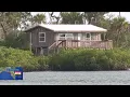 Communities surrounded by water prepare for storm surge high tide from Hurricane Idalia