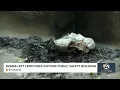 Debris left from fires outside Spokane Public Safety building